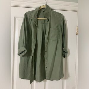 Green button up shirt
